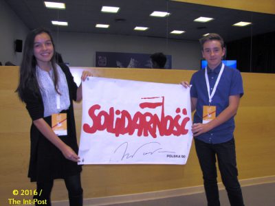 Students proud to have their Solidarnosc sign signed by Lech Walesa in person